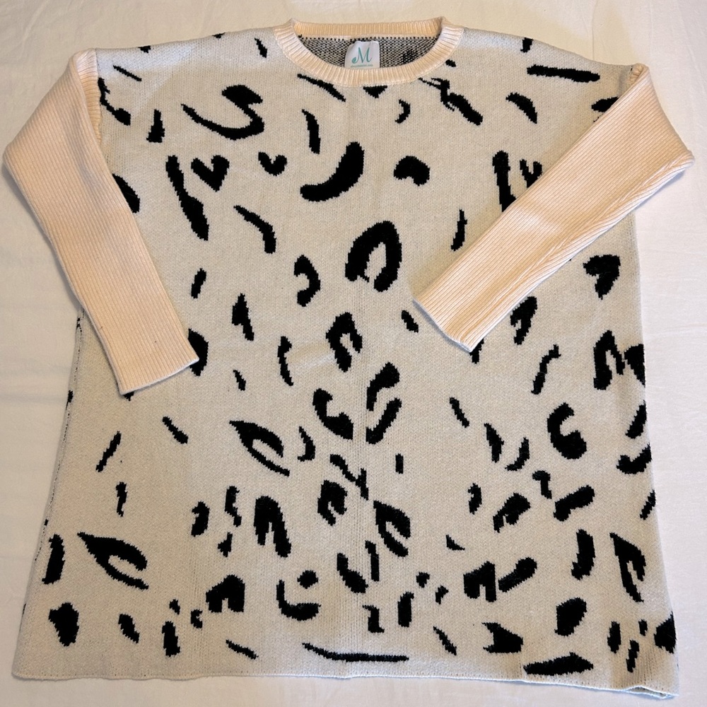 Oversized Brand new sweater without tags.   Purchased from Mint Julep Boutique